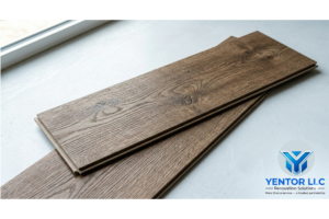 In this detailed shot, the realistic texture and wood-grain finish of a Luxury Vinyl Plank (LVP) are clearly visible. This image highlights the quality and enduring aesthetic that Yentor LLC delivers in its flooring installations throughout Southwest Florida.
